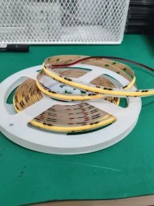 Dim-to-warm COB LED strip light 12W 10mm 24V 1800K-3500K for indoor use