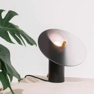 High End Decorative Table Lamp with Nordic Minimalist Design Features Iron Frame and Glass for a Post Modern Bedroom Ambiance